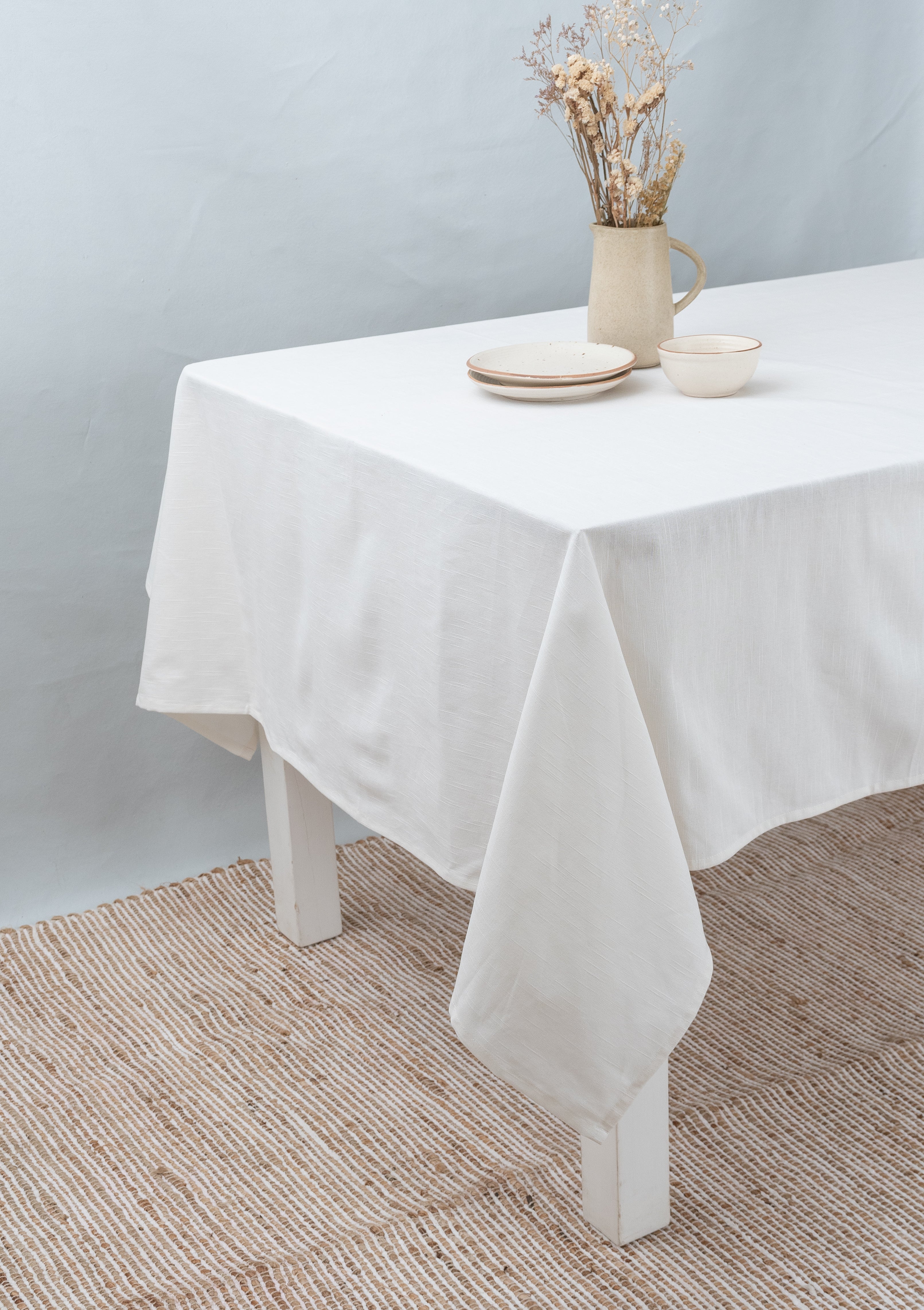 Solid 100% cotton customisable table cloth for dining -  Warm white